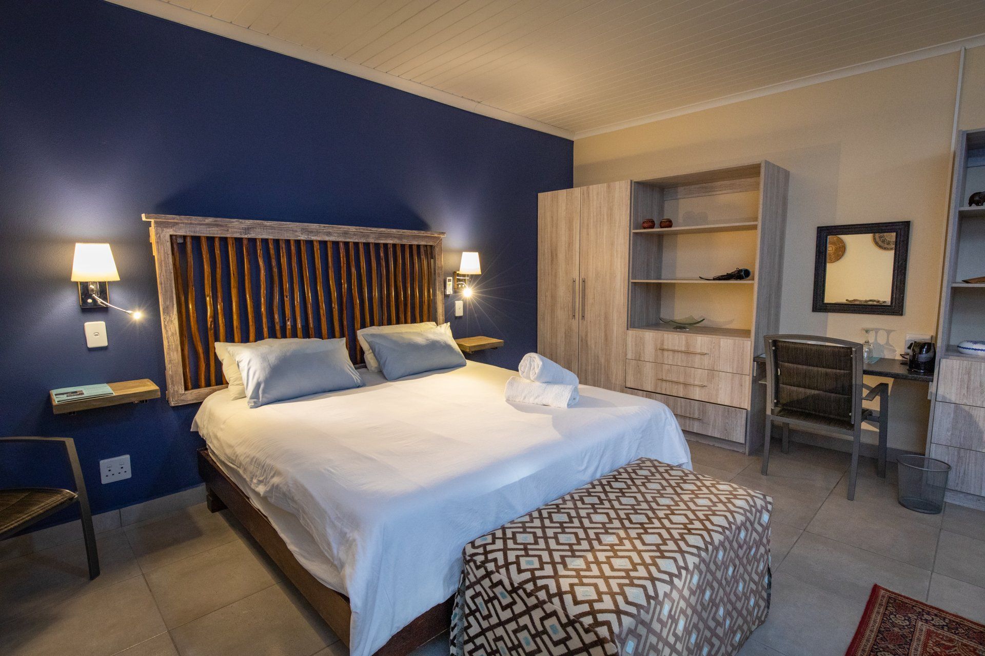 King-size en-suite room and pool at A Suite Dream, Hoedspruit Wildlife Estate